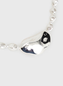 Silver-toned necklace Pearl detail, large pendant, lobster clasp fastening