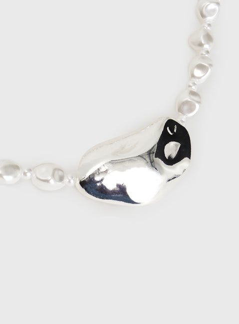 Silver-toned necklace Pearl detail, large pendant, lobster clasp fastening