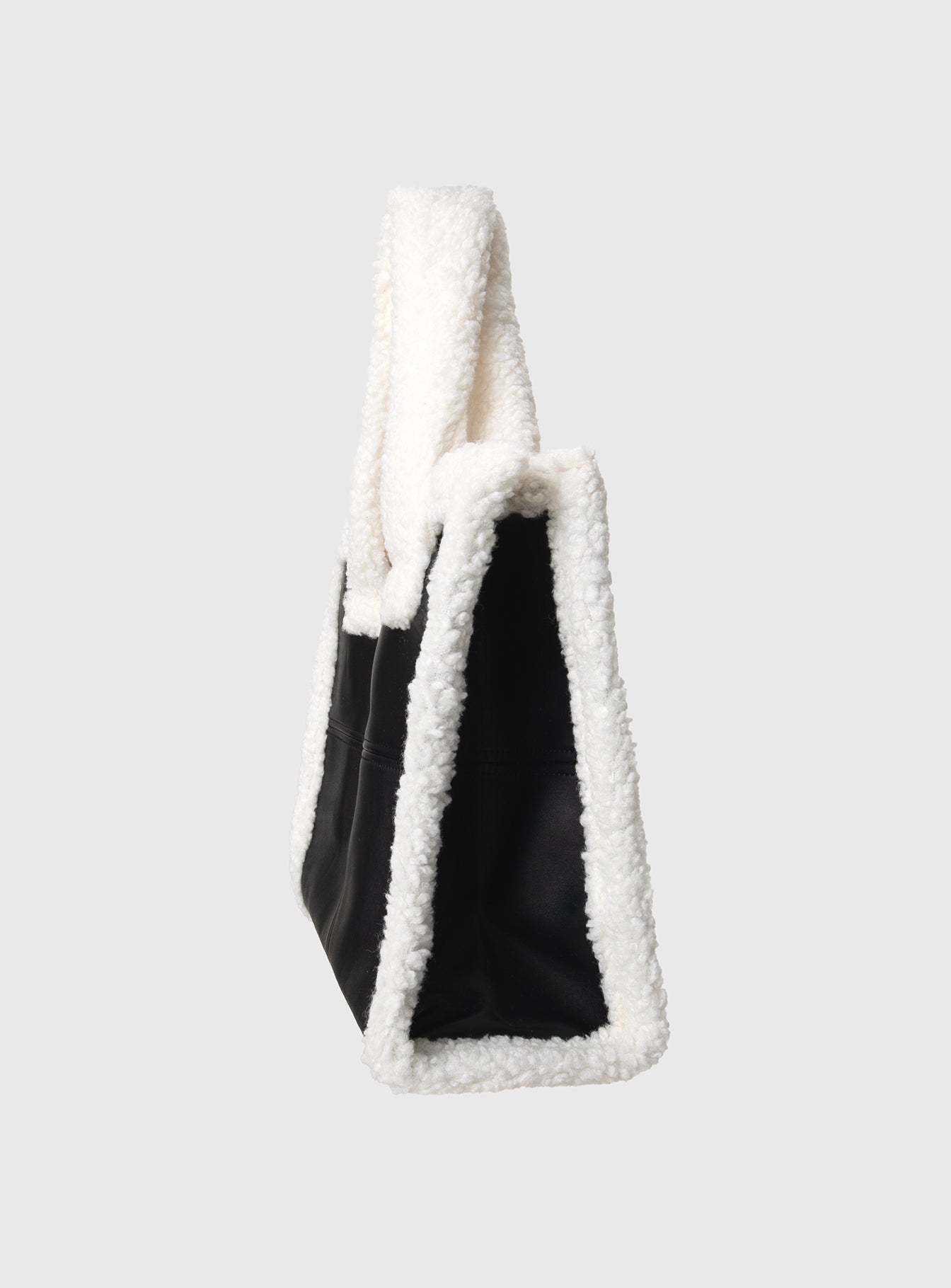 Faux leather tote bag   Fixed shoulder straps, fleece lining and trims, flat base