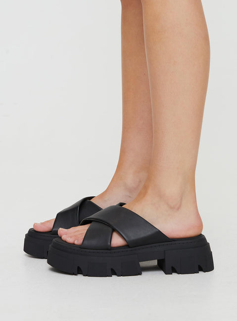 Faux leather sandals Cross strap upper, platform base, treaded sole, rounded toe