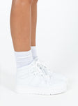 Sneakers Faux leather material  High top style  Padded inner & tongue  Platform design  Treaded sole 