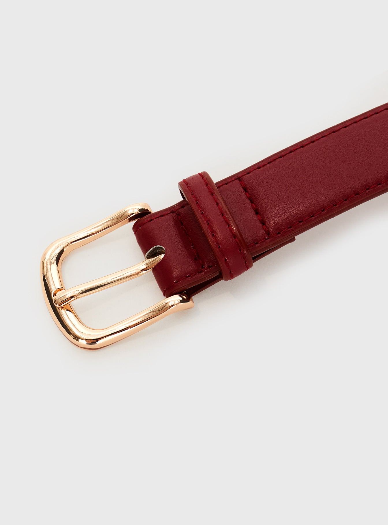 Red Faux leather belt with gold-toned buckle