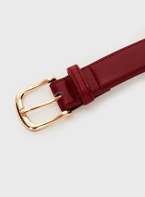 Red Faux leather belt with gold-toned buckle