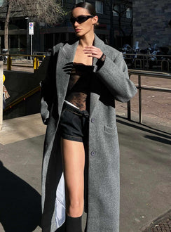 Coat Lapel collar Button fastening at front Front pockets