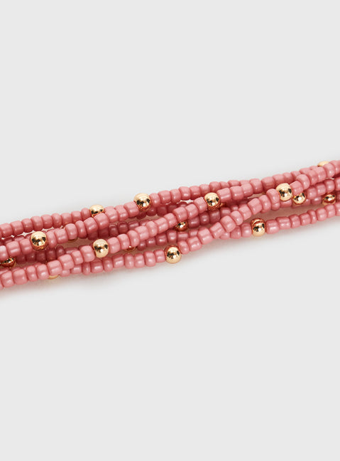 Necklace Beaded style, six chain design, gold-tone detail, lobster clasp fastening