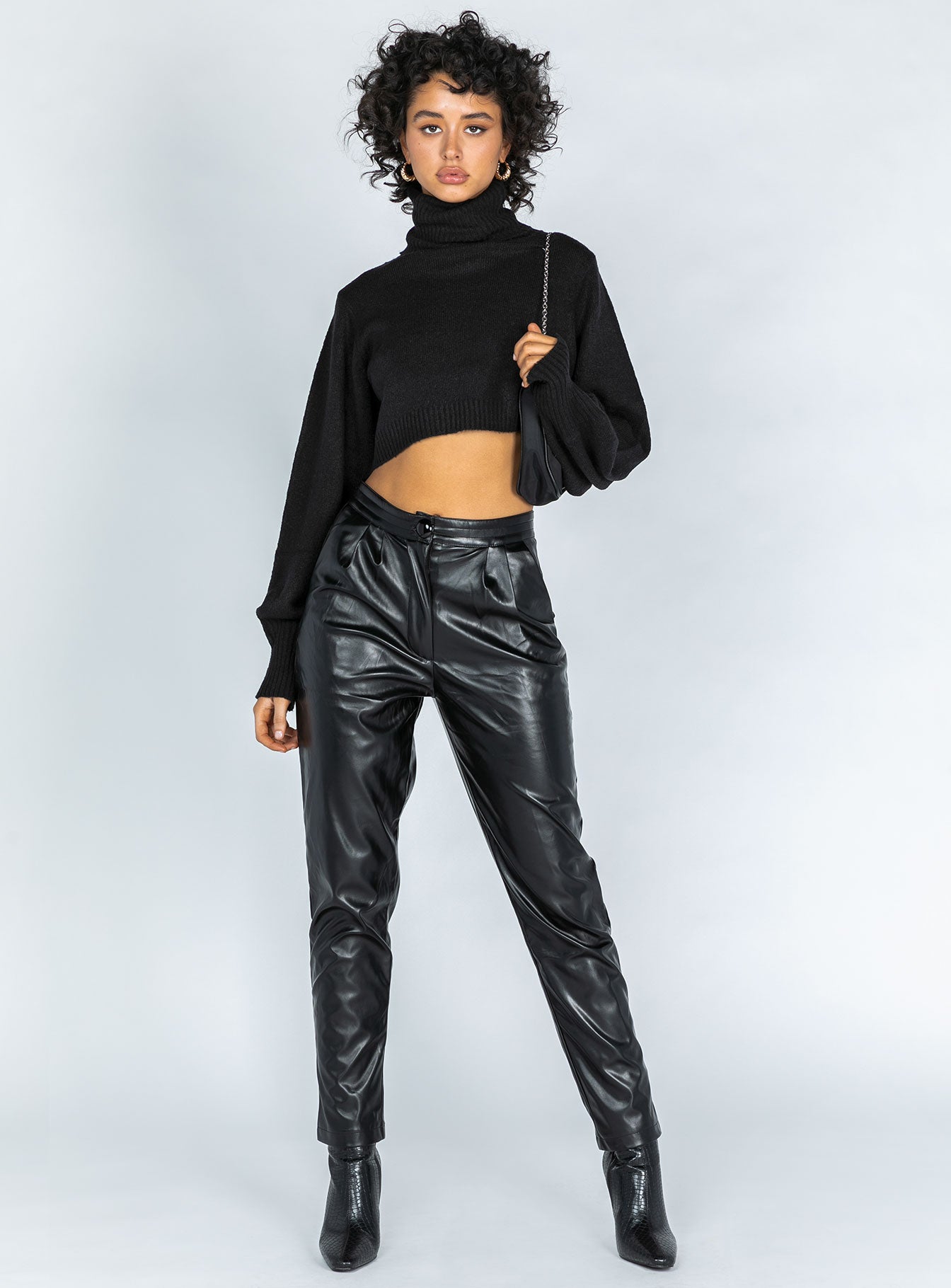 front view of model wearing Princess Polly Zahara Cropped Turtleneck Sweater Black Petite Cropped 