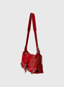 Shoulder bag Faux leather, adjustable strap, zip and button closure, silver-toned hardware, flat base, internal pockets