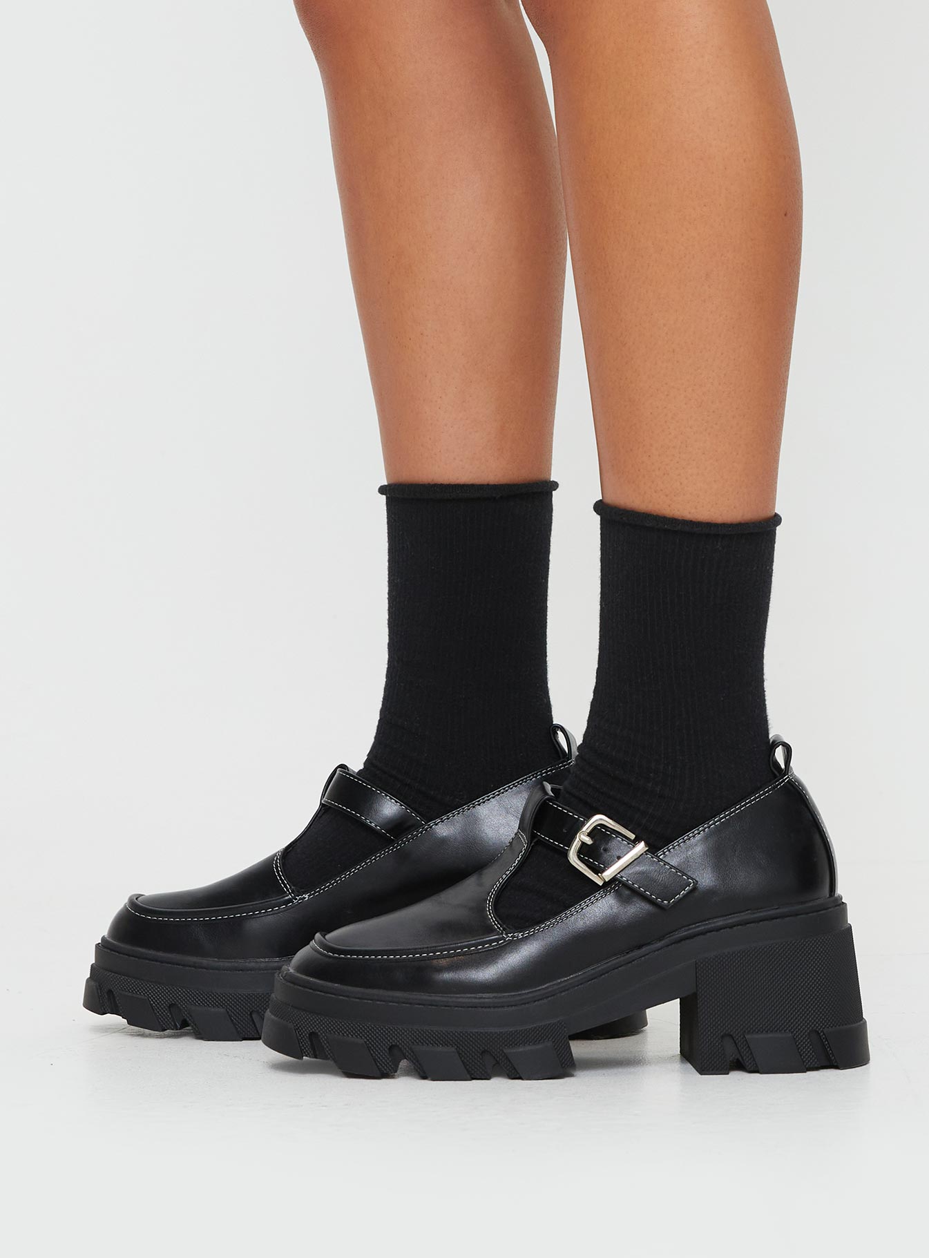 Mary jane heels  Faux leather single strap upper, contrast stitching, treaded sole, platform style, buckle fastening with silver-toned hardware