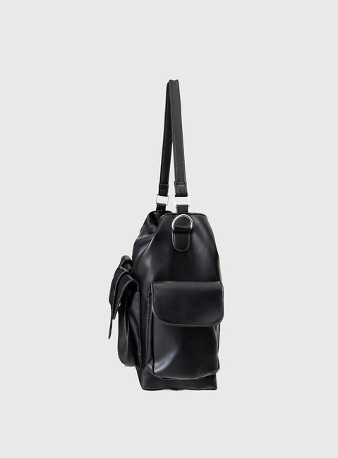 Faux leather bag Adjustable & removable shoulder and crossbody straps, silver-toned hardware, zip fastening, four external magnetic button fastening pockets, flat base