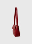 Faux croc leather shoulder bag Gold-toned hardware, zip and button fastening, internal zip & slip pockets, flat base
