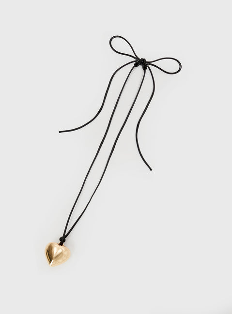 Gold-toned necklace Heart pendant, adjustable tie fastening