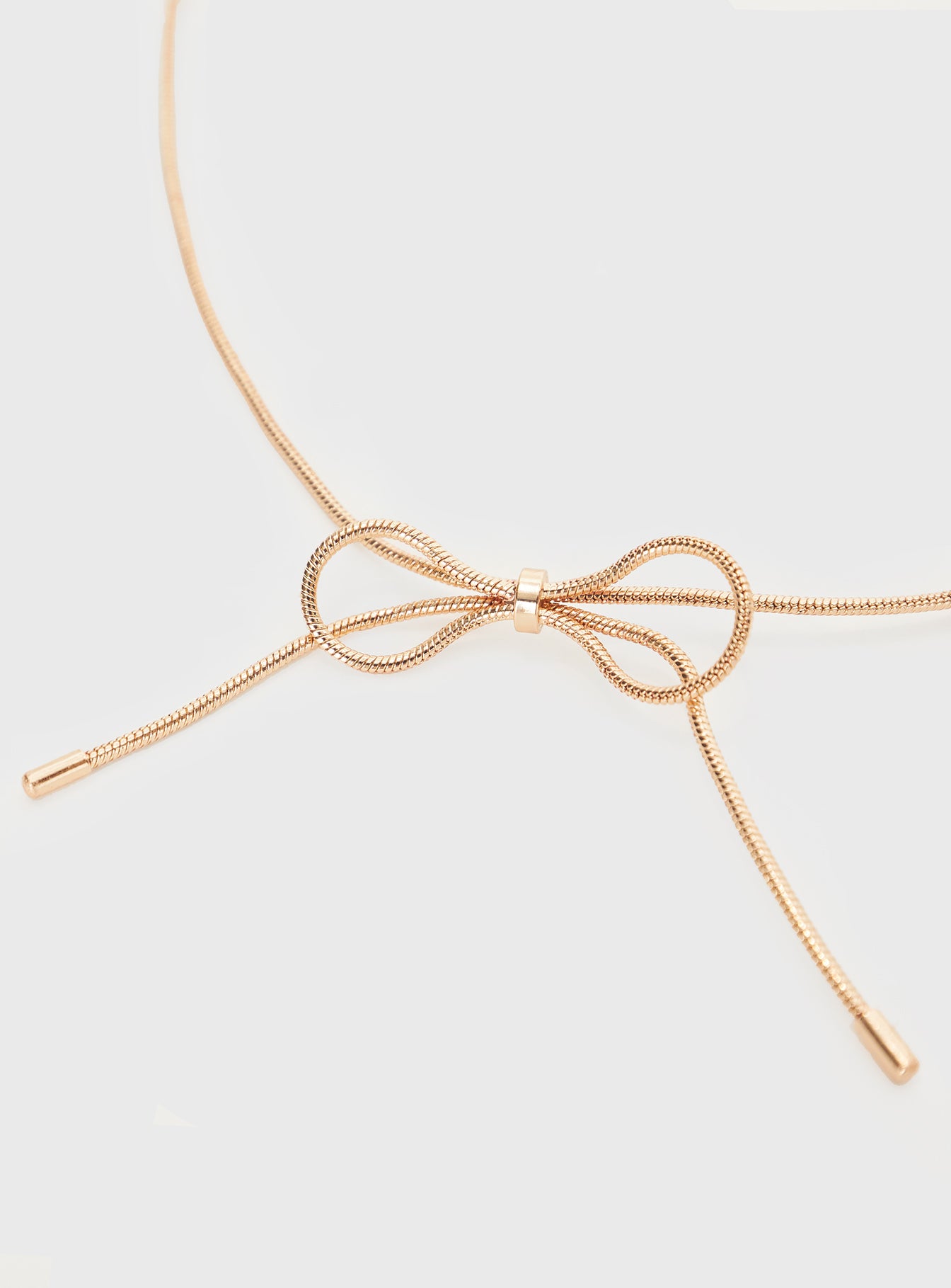 Gold-toned necklace Bow detail, lobster clasp fastening