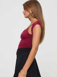 Burgundy top Cut outs at bust, cap sleeves