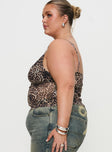 side view of model wearing Princess Polly Fast Times Top Leopard Curve Sleeveless Plunger 