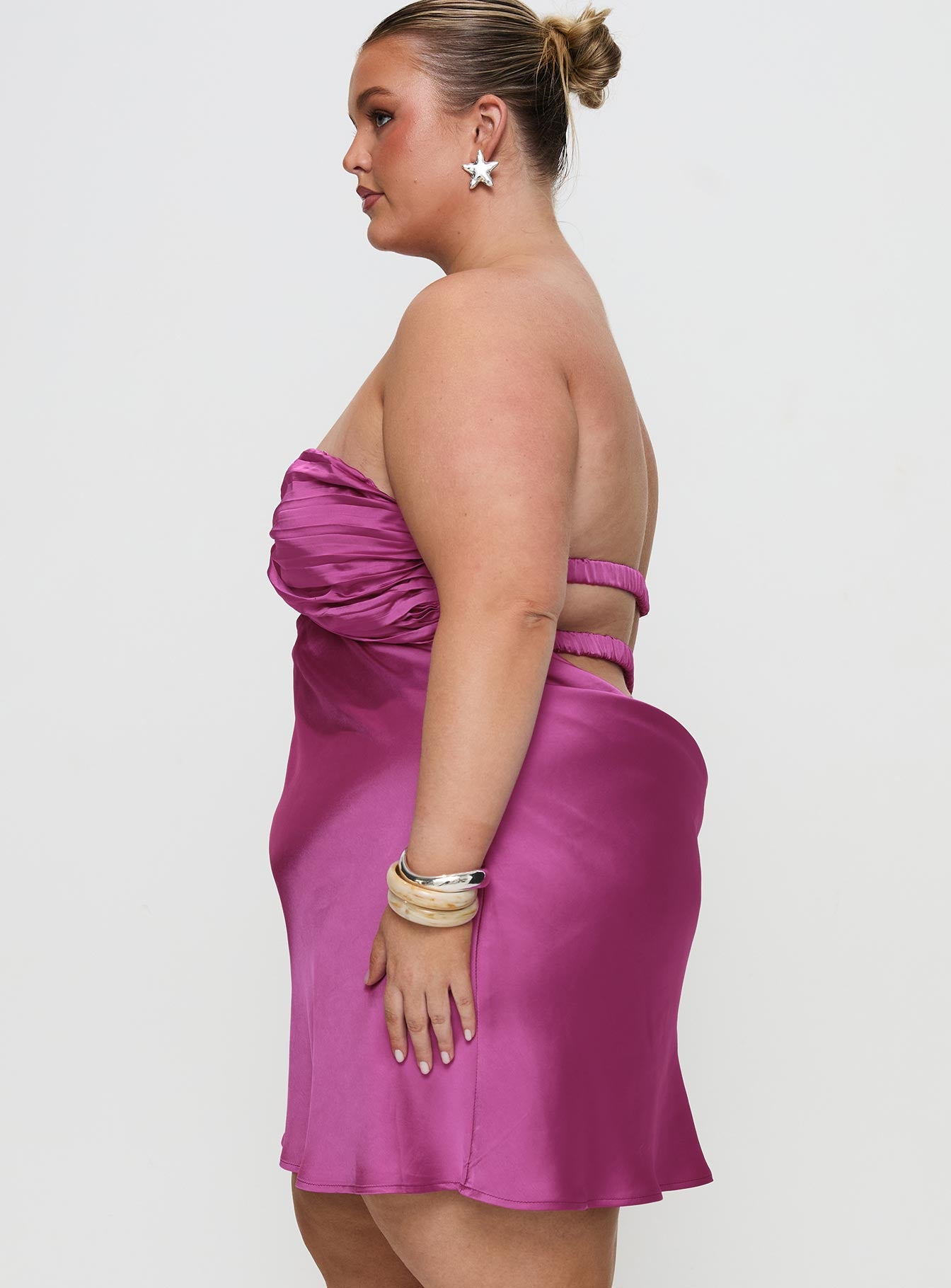 side view of model wearing Princess Polly Faviola Mini Dress Purple Curve Sweetheart Neckline 