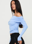 side view of model wearing Princess Polly Woolton Long Sleeve Top Blue Full Sleeves Asymmetric Neckline 