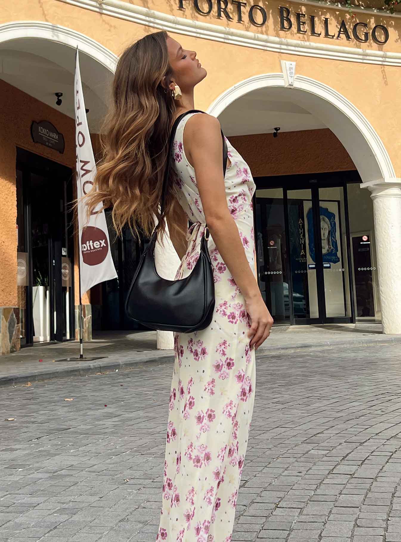 side view of model wearing Princess Polly Nellie Midi Dress Yellow Floral Petite Plunger 