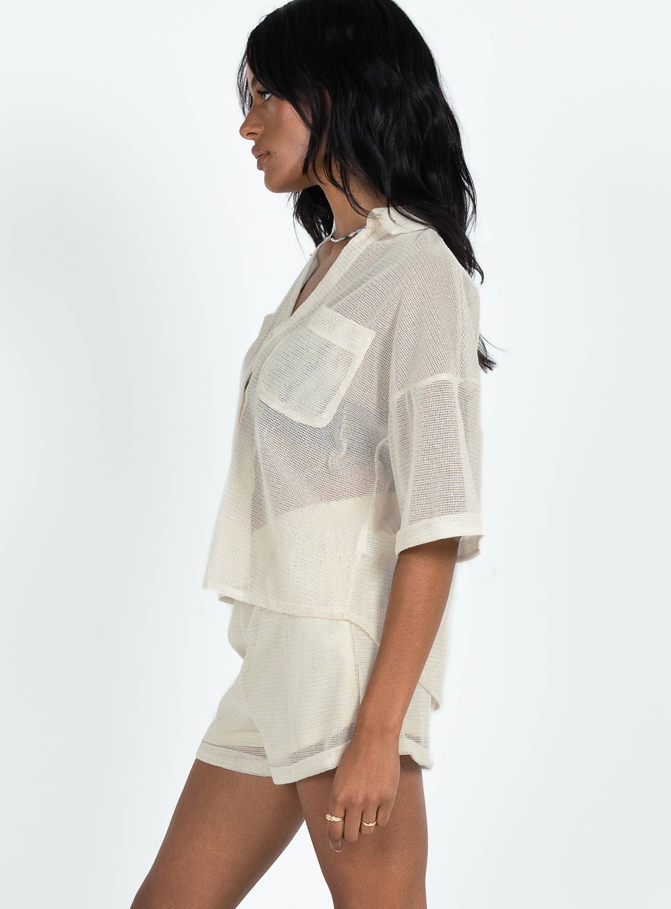 Matching set Sheer material Button up shirt Classic collar Button fastening at front Drop shoulder  Twin chest pockets Shorts High rise Elasticated waistband