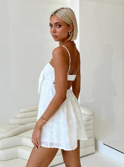 side view of model wearing Princess Polly Granno Mini Dress White Tall Sweetheart Neckline 
