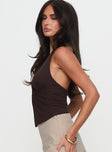 side view of model wearing Princess Polly No Hard Feelings Twist Top Brown Sleeveless Plunger 