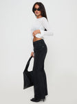 side view of model wearing Princess Polly Kemsley Mid Rise Bootleg Jeans Washed Black Mid Rise 