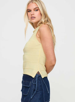 side view of model wearing Princess Polly Hisplane Knit Top Cream Sleeveless Crew Neck 