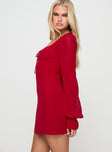 side view of model wearing Princess Polly Bayford Long Sleeve Mini Dress Red Square Neck 