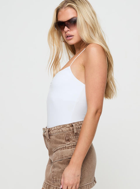 side view of model wearing Princess Polly Bekks Bodysuit White Sleeveless V-Neck 