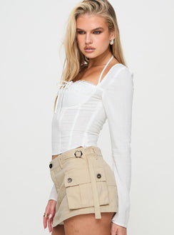 side view of model wearing Princess Polly Talgada Long Sleeve Top White Full Sleeves Square Neck 