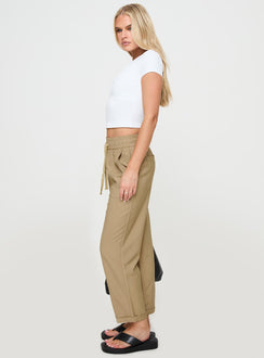 side view of model wearing Princess Polly Tillas Pants Beige High Waisted Pants 