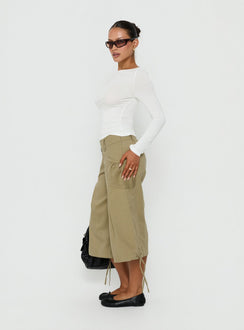 Crafted with the Iria Capri Trouser Khaki womens-regular-pants featuring mid-rise waist side view of model wearing Princess Polly