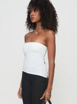 Strapless top Asymmetrical hem, split hem at die, button detail Good stretch, lined bust Princess Polly Lower Impact 