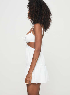 side view of model wearing Princess Polly Go With You Mini Dress White Sweetheart Neckline 