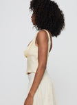 side view of model wearing Princess Polly Delilah Top Ivory Sleeveless Plunger 