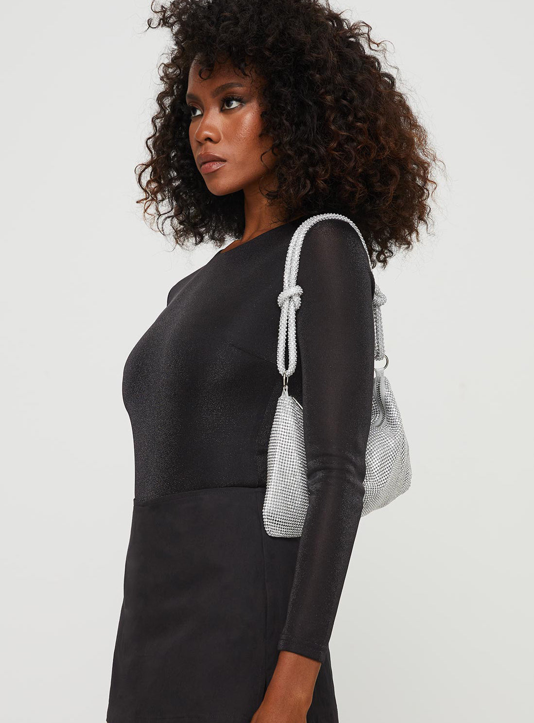 side view of model wearing Princess Polly Knighton Long Sleeve Bodysuit Black Full Sleeves Crew Neck 