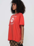 side view of model wearing Princess Polly Party In Barcelona Oversized Tee Red Half Sleeves Crew Neck 