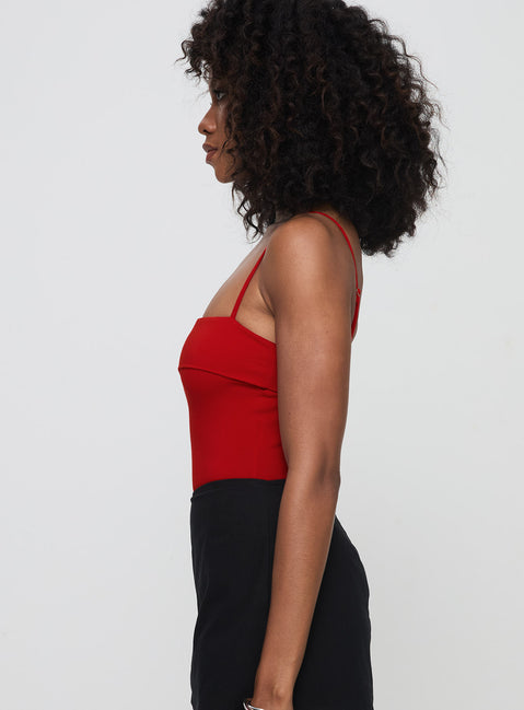 side view of model wearing Princess Polly Lilani Bodysuit Red Sleeveless Square Neck 