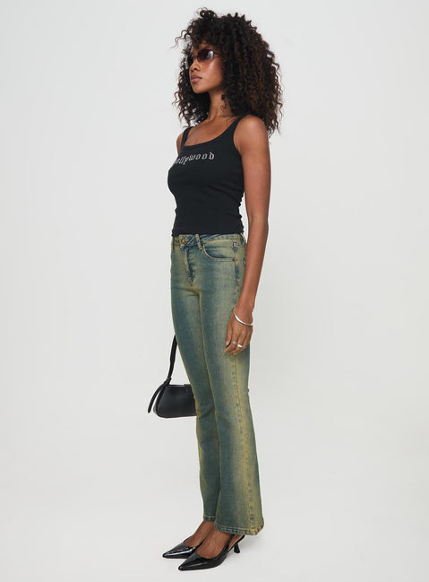 side view of model wearing Princess Polly Sandman Flare Jeans Antique Wash Mid Rise 