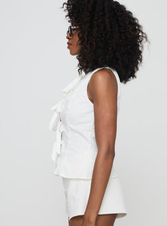 side view of model wearing Princess Polly Luminary Tie Up Top White Sleeveless Crew Neck 