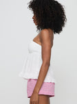 side view of model wearing Princess Polly Be Your Girl Strapless Top White Sleeveless Asymmetric Neckline 