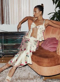   side view of model wearing Princess Polly Alegria Maxi Skirt Floral Maxi 