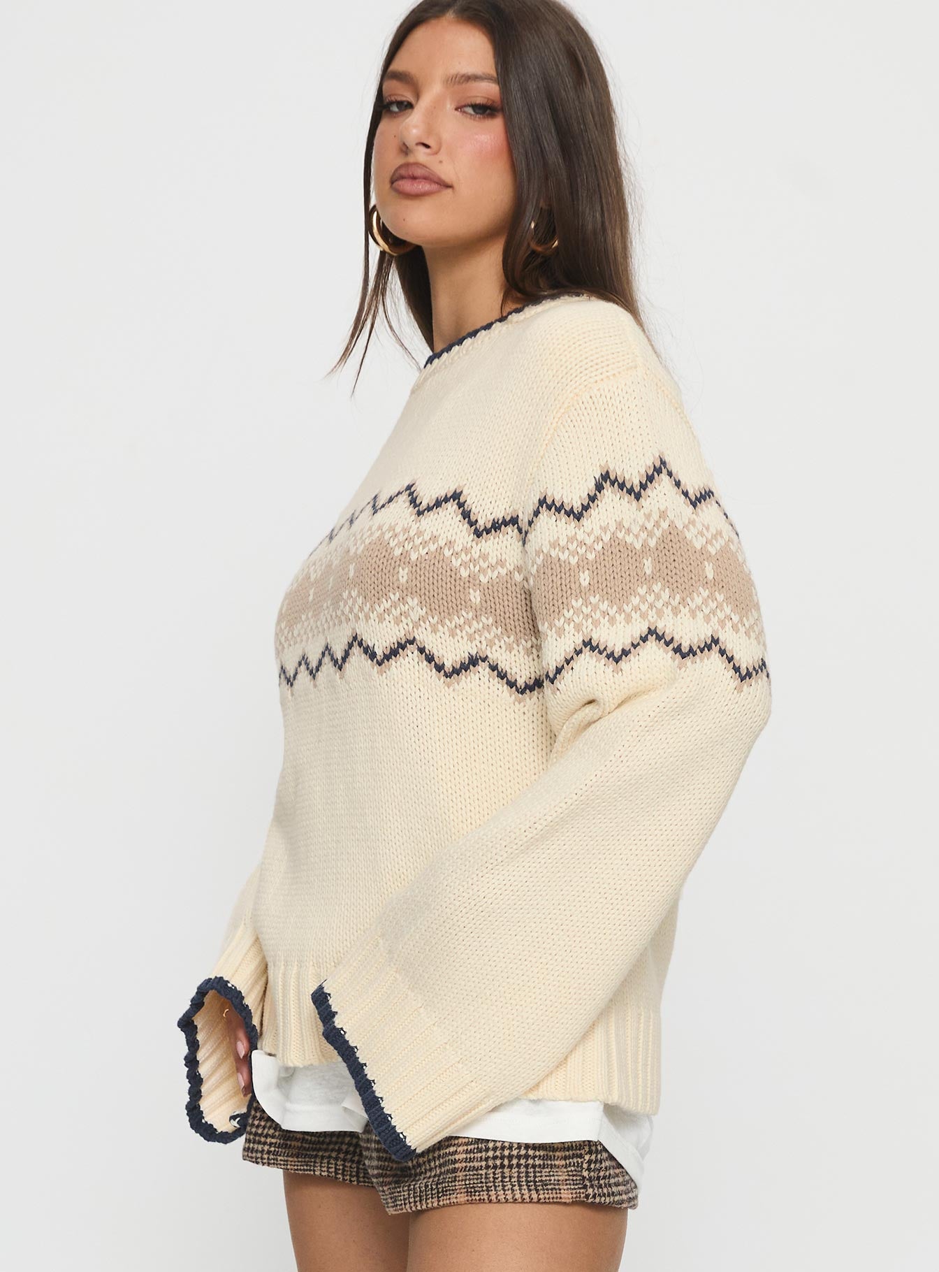 side view of model wearing Princess Polly Madalynn Knit Graphic Jumper Beige Long 