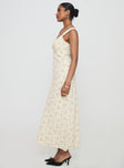 side view of model wearing Princess Polly Fernwood Maxi Dress Yellow Floral Plunger 