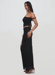   side view of model wearing Princess Polly Mastermind Ruched Maxi Skirt Black Maxi 