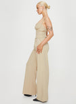 Beige Matching set Slim fitting adjustable shoulder straps sweetheart neckline zip fastening at back Tailored pants zip and clasp fastening twin hip pockets subtle pleats at waist