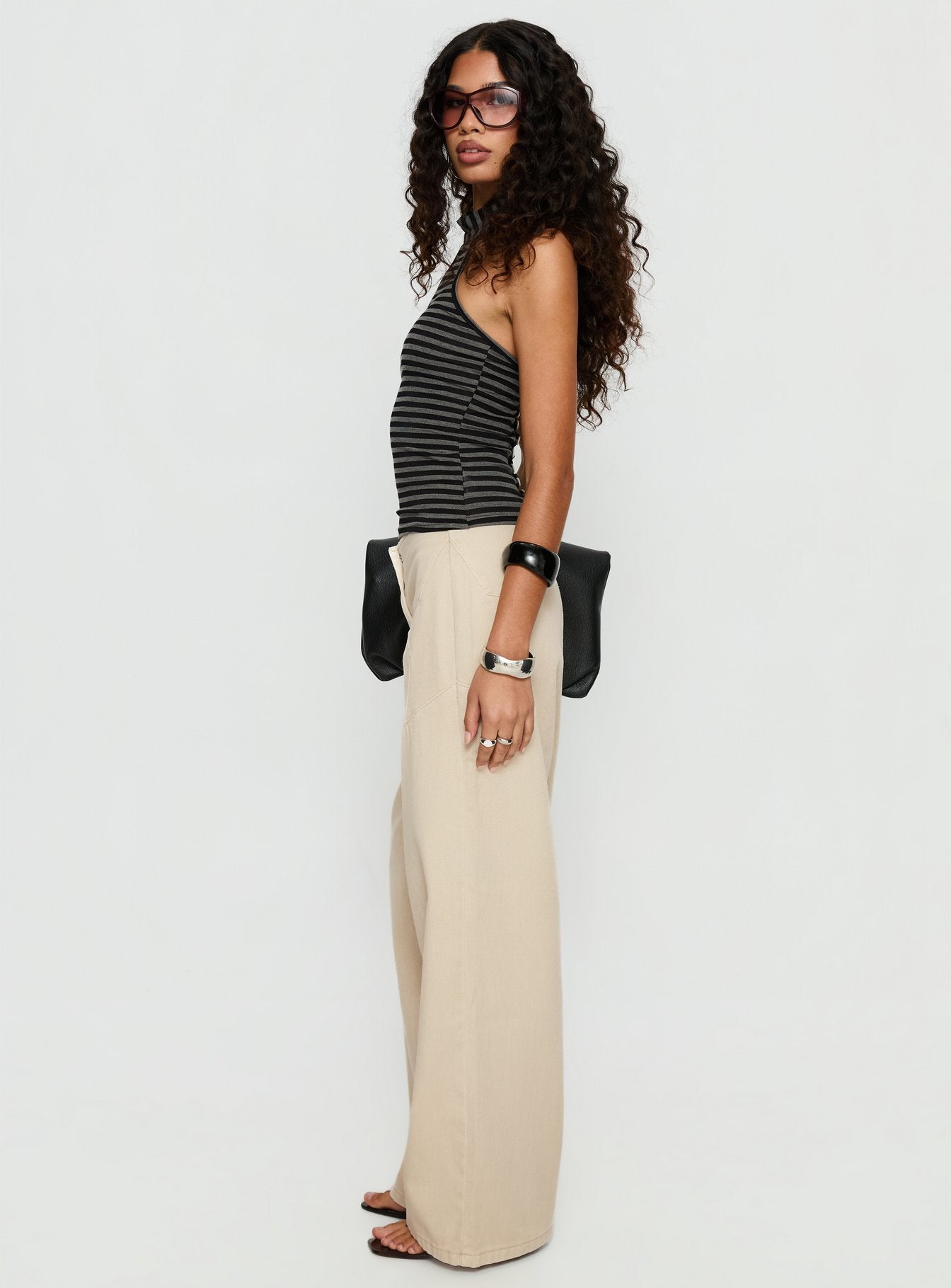 side view of model wearing Princess Polly Dolley Star Stitch Mid Rise Wide Leg Jean Ecru Mid Rise Jeans 