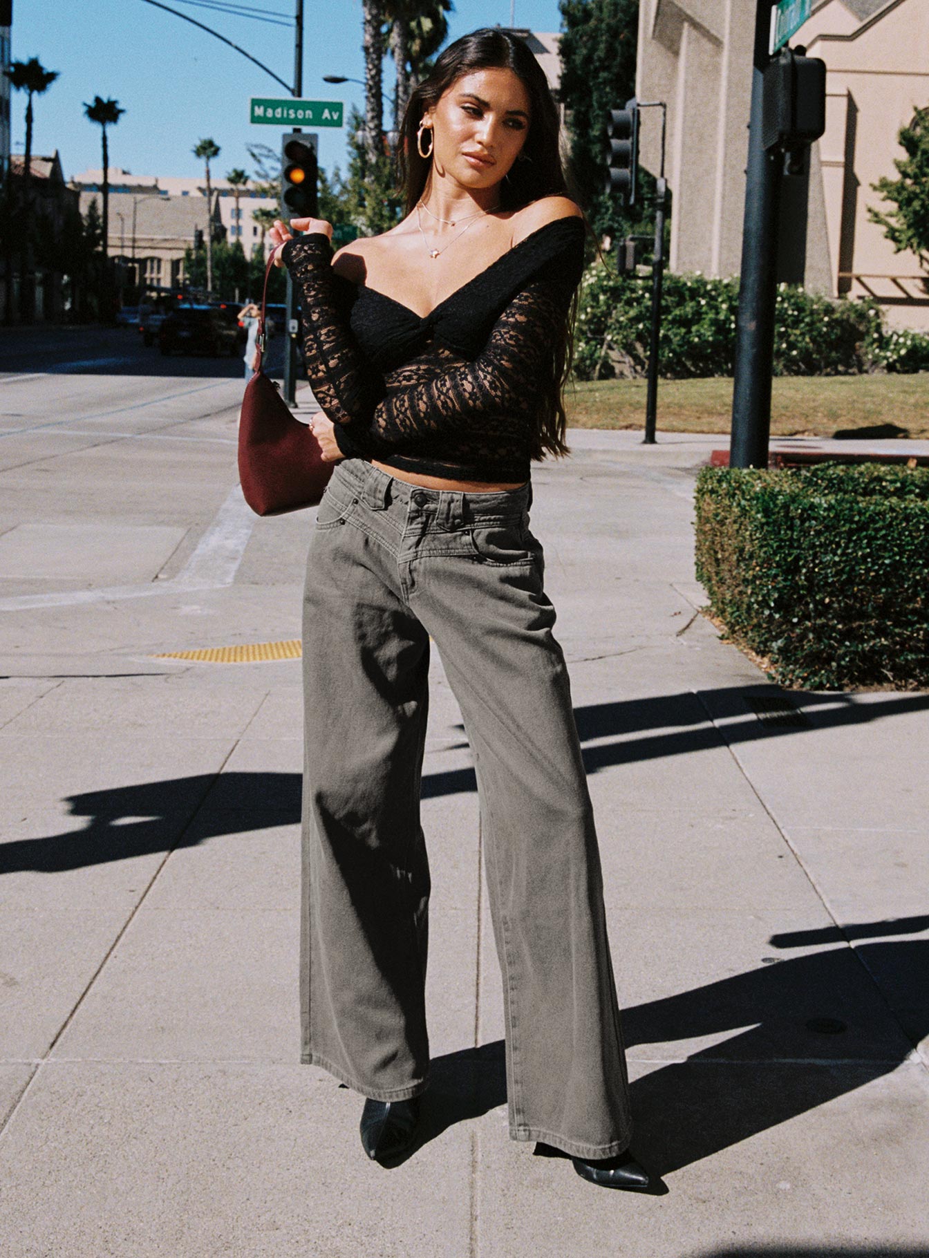 back view of model wearing Princess Polly West Side Jeans Grey Wash Mid Rise 