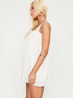 side view of model wearing Princess Polly Cupids Bow Mini Dress White Square Neck 