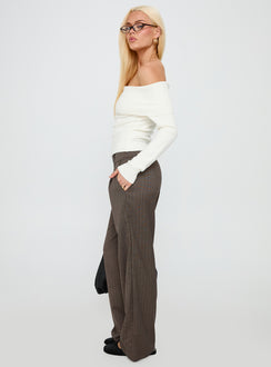 side view of model wearing Princess Polly Briellea Thick Waistband Pant Pinstripe Low Rise Pants 