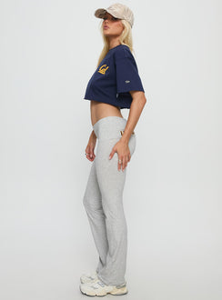 side view of model wearing Princess Polly UC Berkeley Foldover Pants Grey Mid Rise Pants 